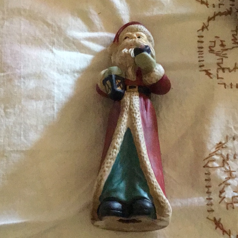 Festive Santa Claus Figurine in Red and Green